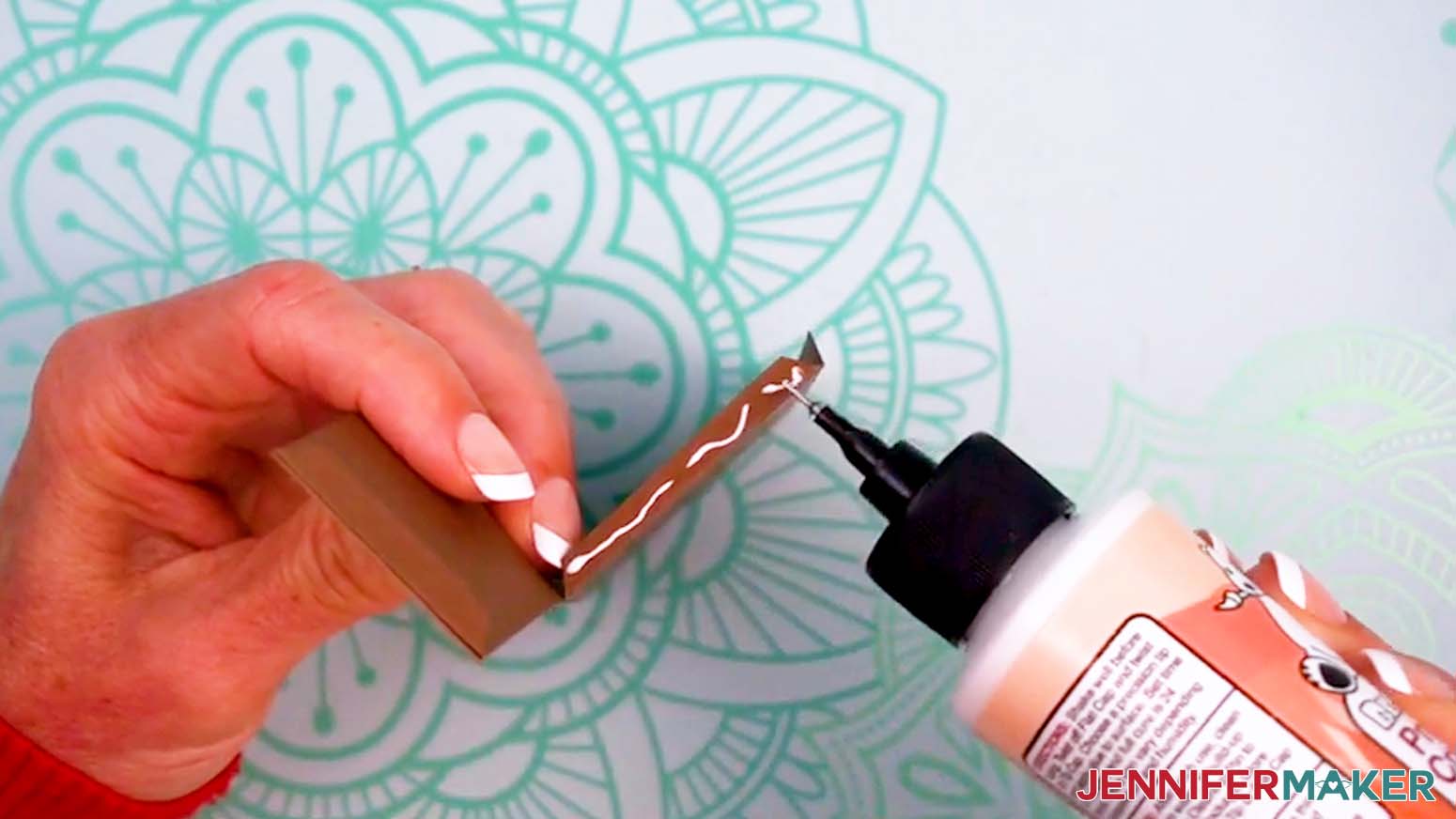 Add glue to the short base tab.