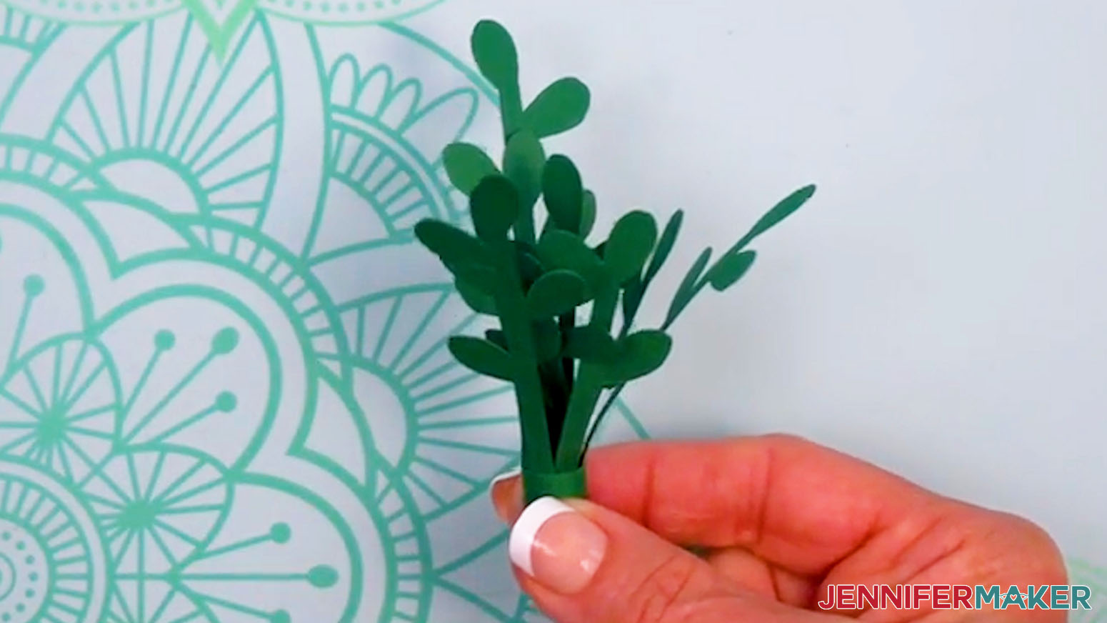 The jade plant rolled and glued to complete it.