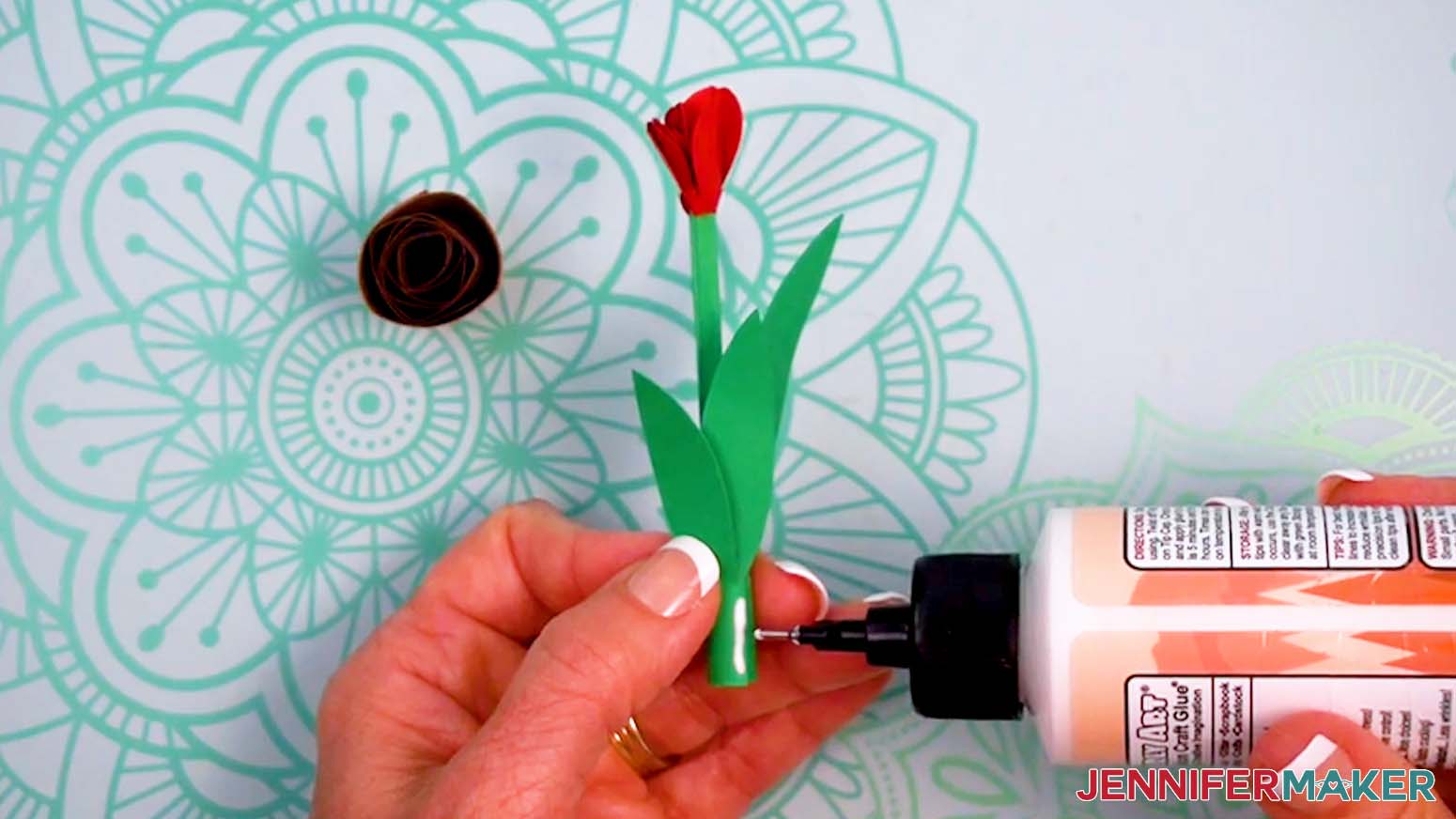 Add a little glue to help the flowers stay upright in the pot.