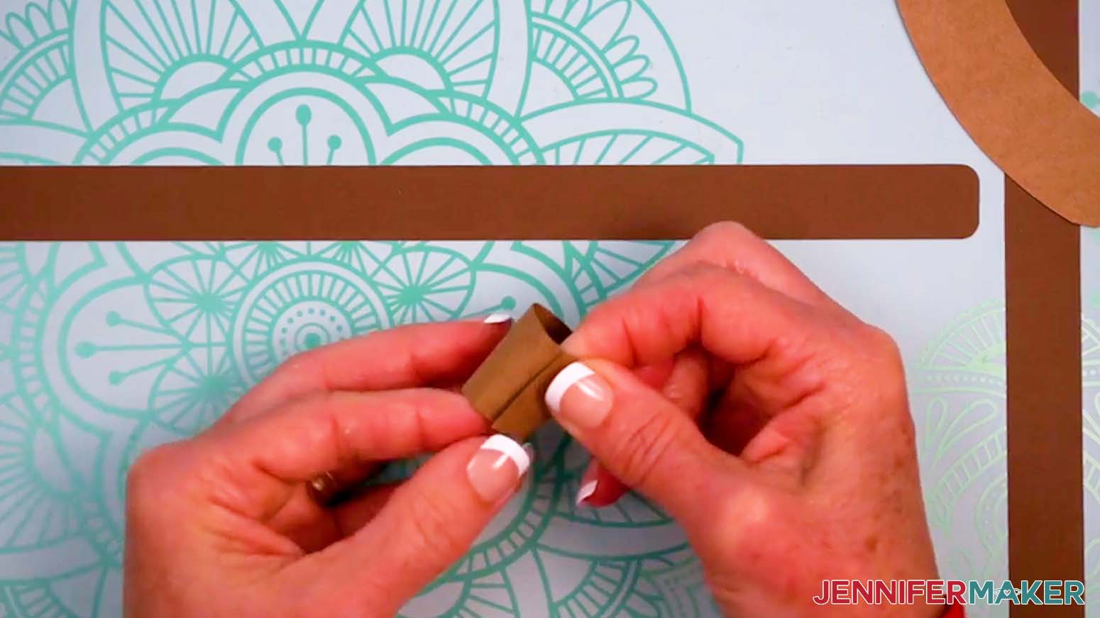 Add glue to the edge of the rolled pot piece.