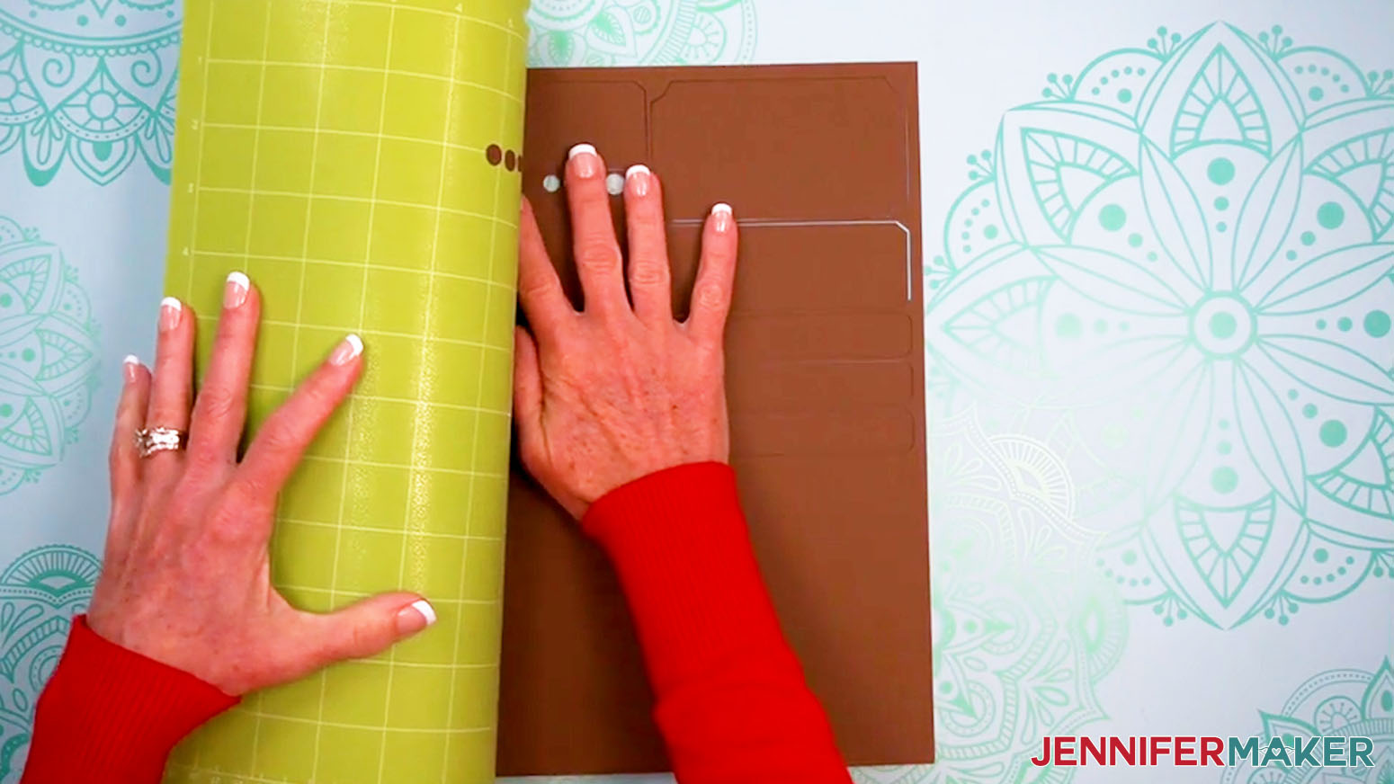 Flip the mat and roll it away from the cut cardstock.