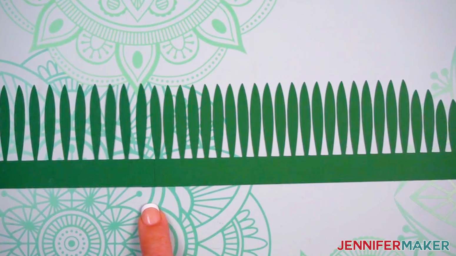 Glue the two pieces together to make a longer strip of leaves.