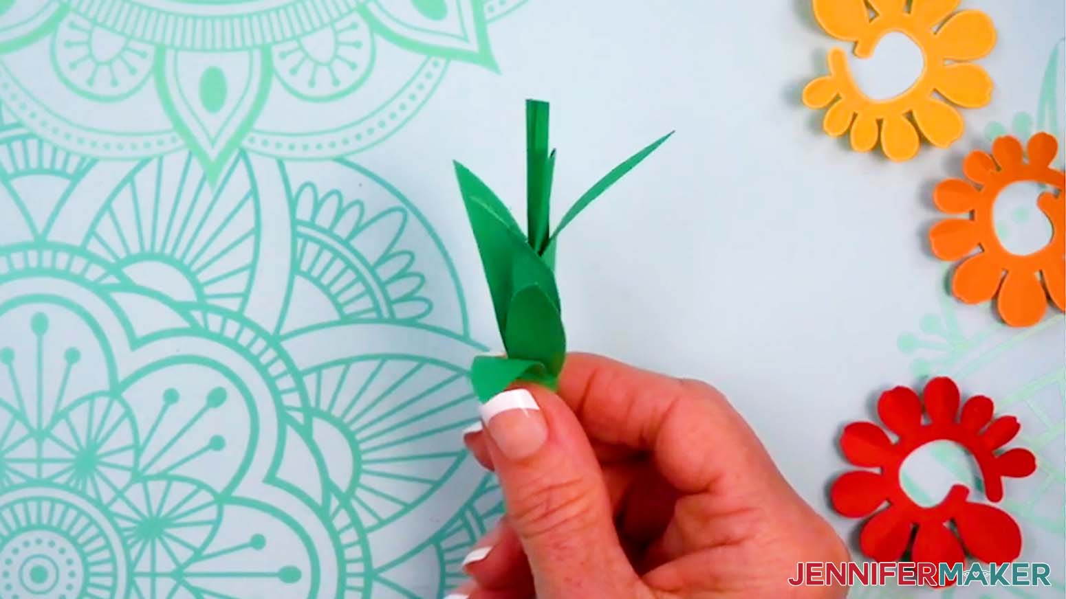 Roll the stems and leaves for the three tulips.