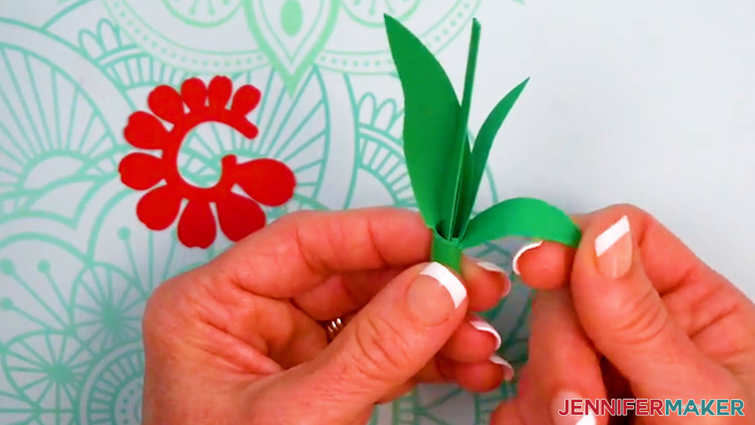 Gently shape the leaves on the tulip stem.