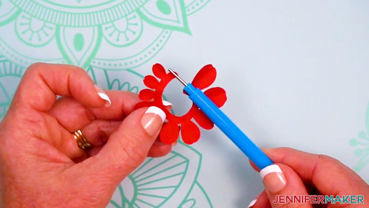 Insert the small end of the tulip into a quilling tool.