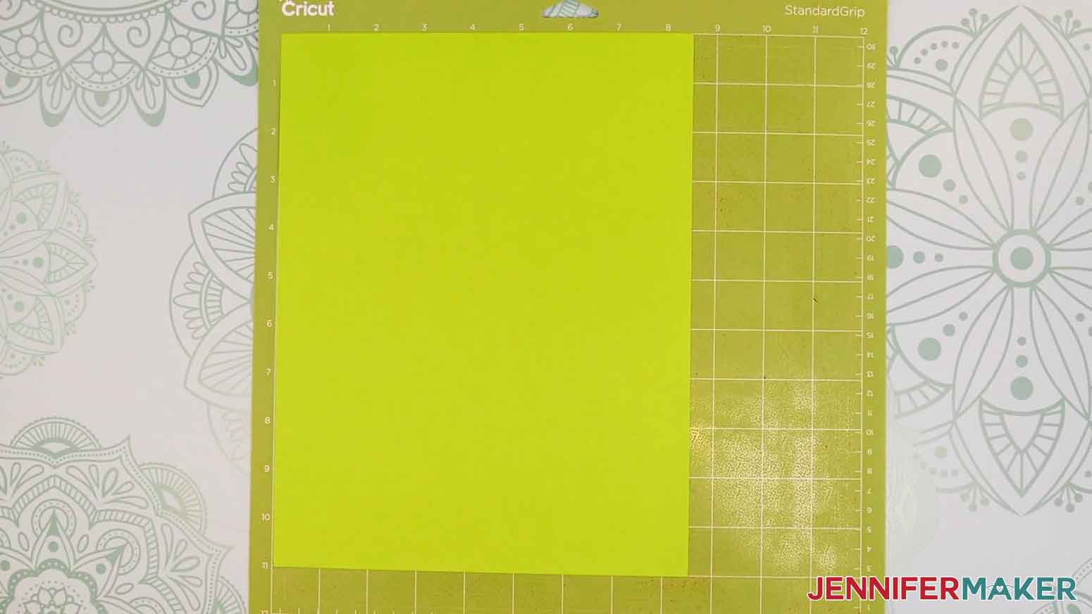 Place your cardstock face up on a green StandardGrip machine mat.