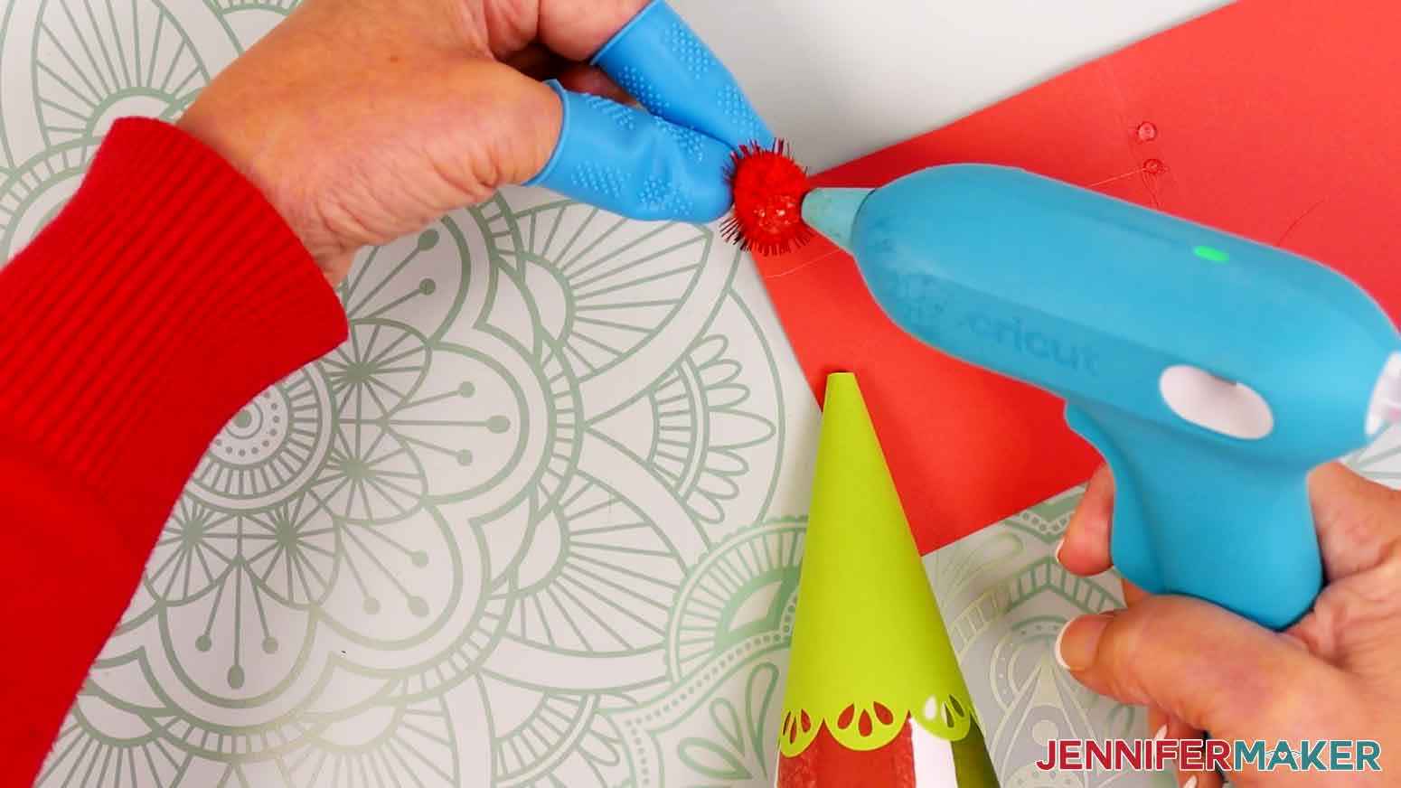 Flip the pom pom over and add a dab of hot glue to the bottom.