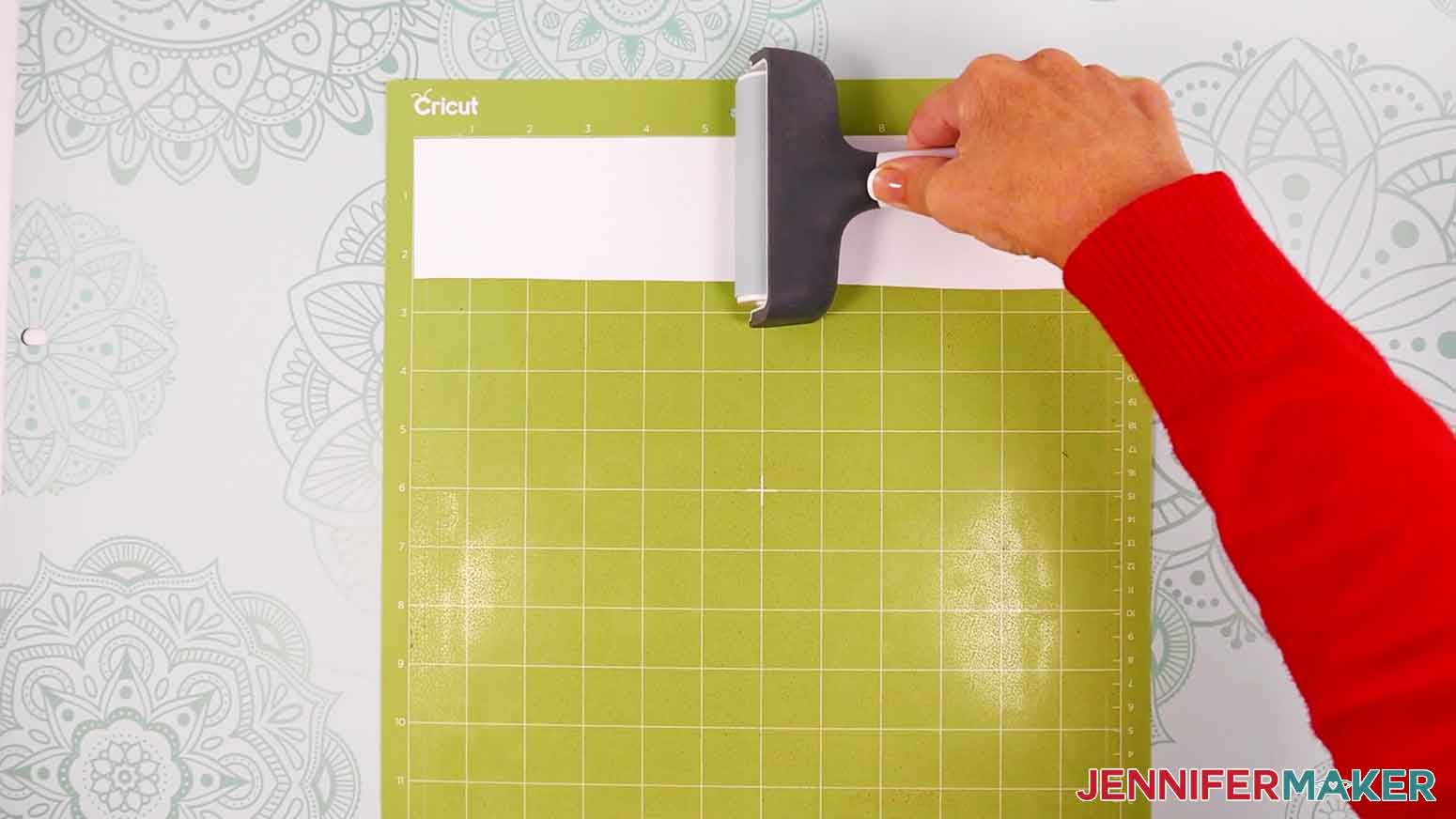 Place your vinyl pretty side up on a green StandardGrip machine mat and use a brayer to make sure it&rsquo;s fully adhered.
