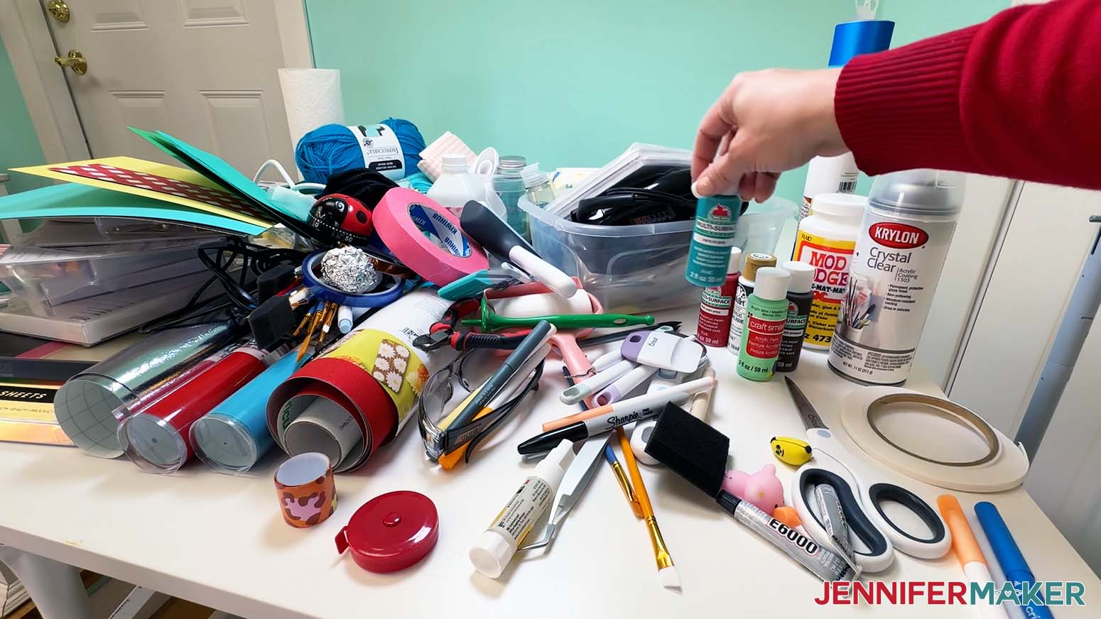Place items like acrylic paint together to organize groups of supplies.