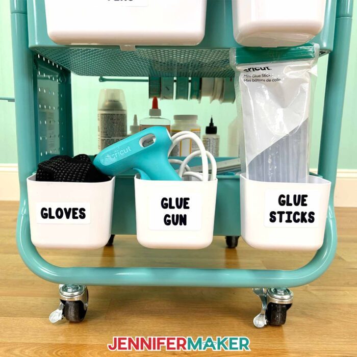 Craft cart with storage labels on plastic bins.