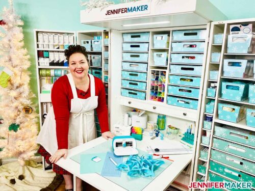 Jennifer Maker with her craft supplies organized into a DreamBox