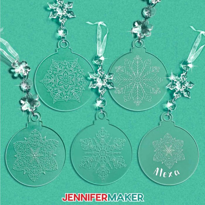 Engraved acrylic ornaments with snowflakes and mandalas. Learn how to do Acrylic Engraving with a Cricut in the free tutorial!