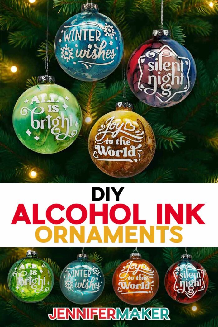 DIY Alcohol Ink Ornaments tutorial by JenniferMaker. Colorful ornaments with vinyl messages hang from a tree.