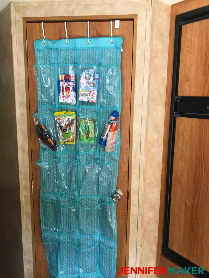 Over the door shoe holder organizing camping supplies