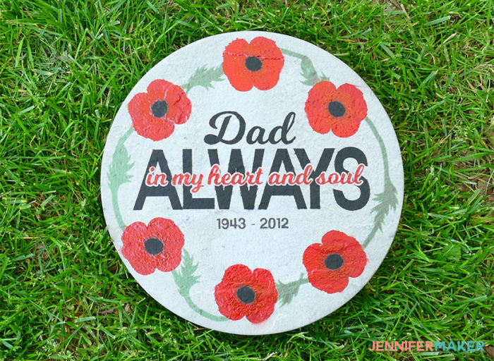A pretty painted stepping stone with poppies