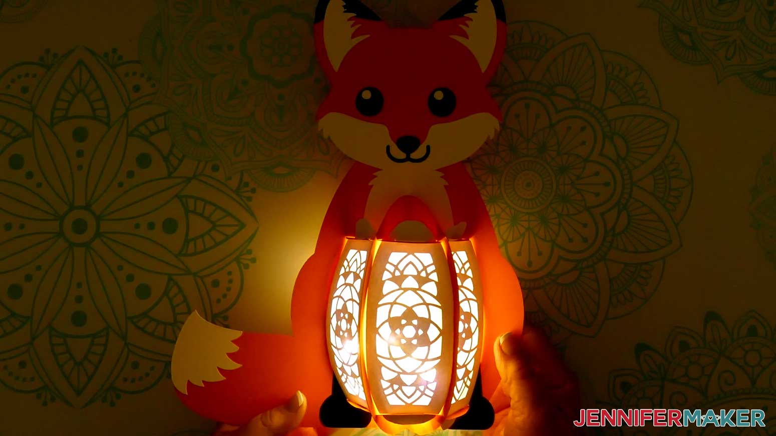 The finished fox paper lantern with the lights in the body lit up.