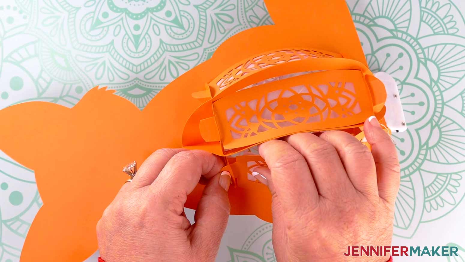 Insert the last orange back panel into the fox paper lantern.