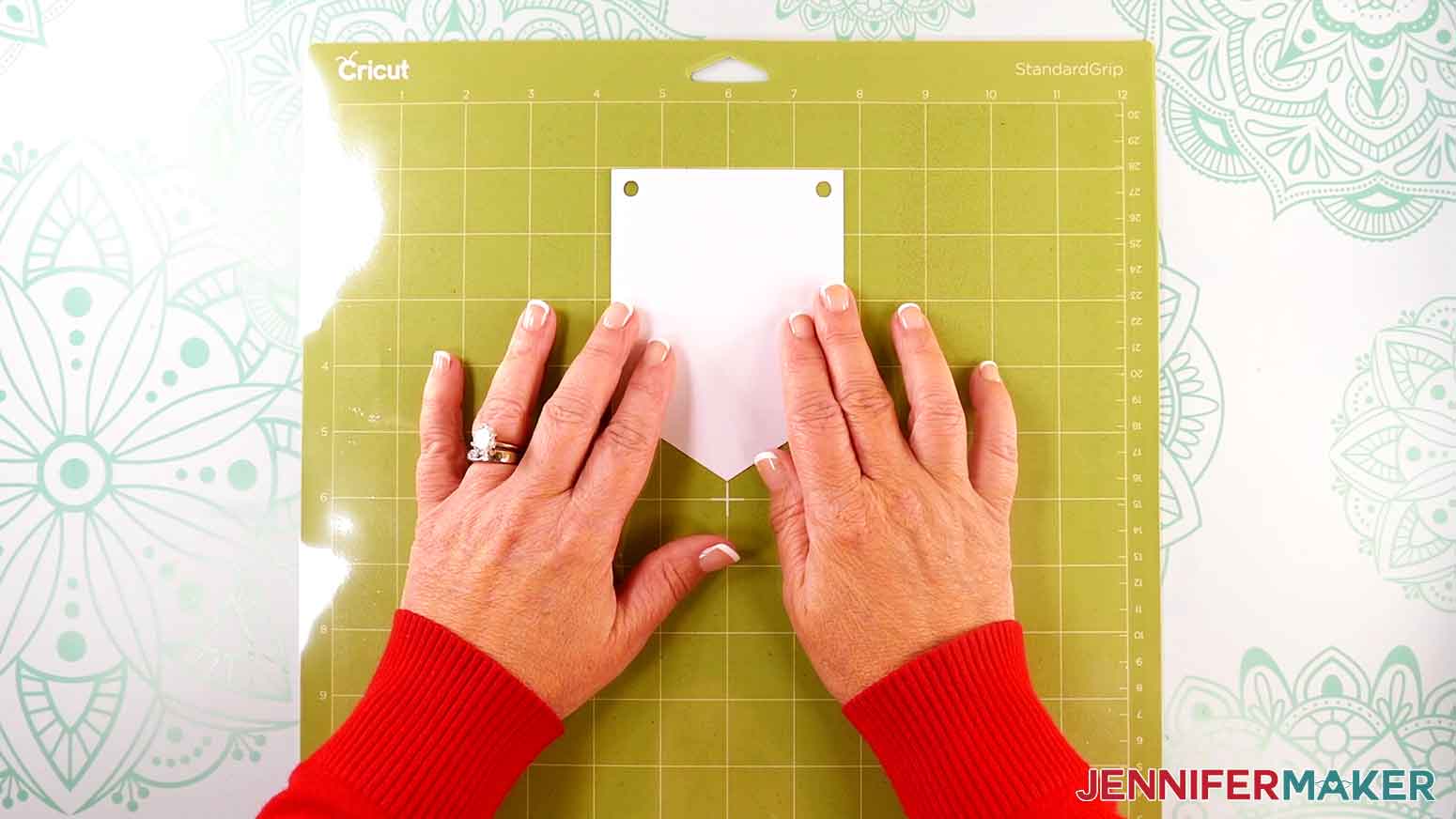 Place the banner panel on the machine mat to help with letter alignment.