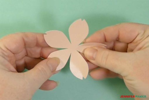 Shaping the paper cherry blossom flower with my fingers