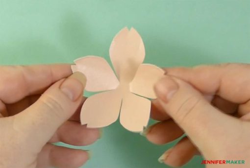 Shaping the paper cherry blossom flower with my fingers