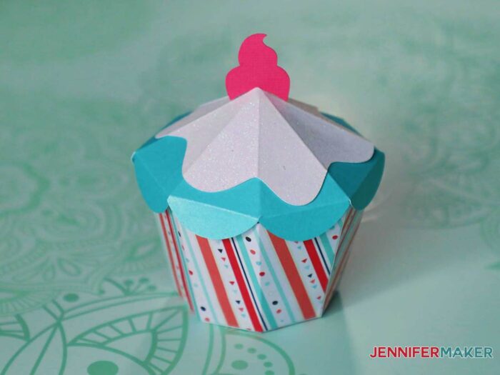 Cute paper cupcake shaped gift box in red, white, and blue