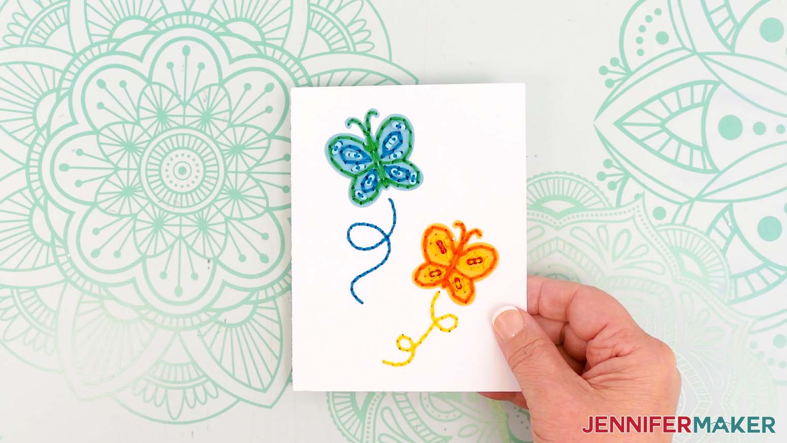 Finsihed paper embroidery cards with butterfly design.