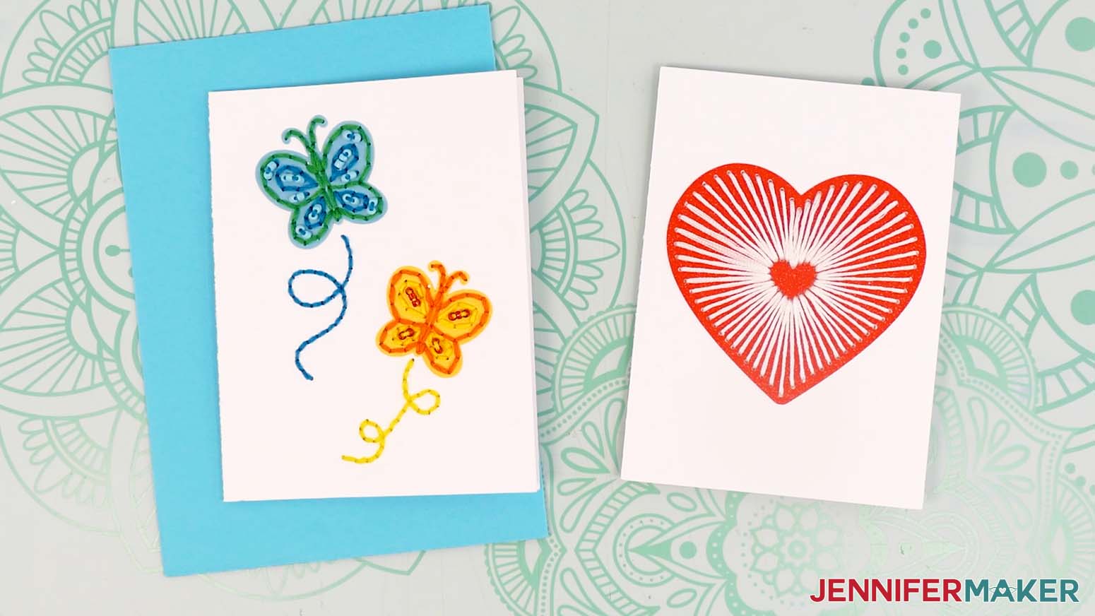 Finished paper embroidery card with the heart design and the butterfly design with an envelope.