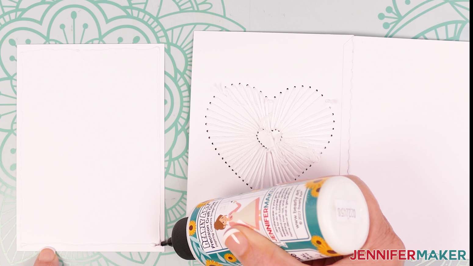 Apply a thin line of craft glue around the edge of the backer piece.