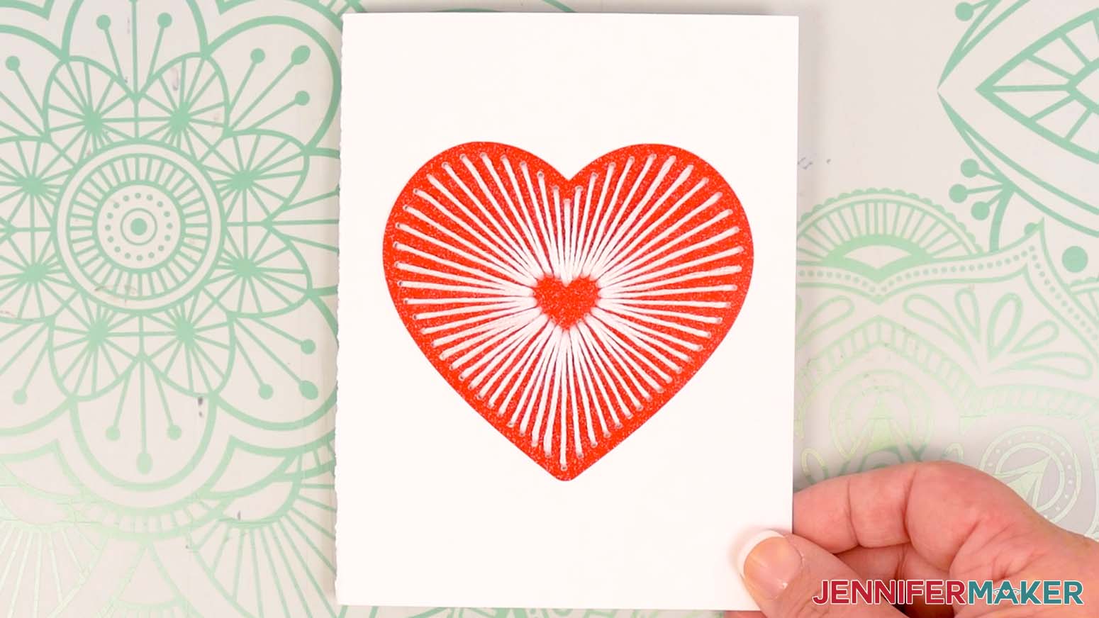 Finished embroidered card heart design.