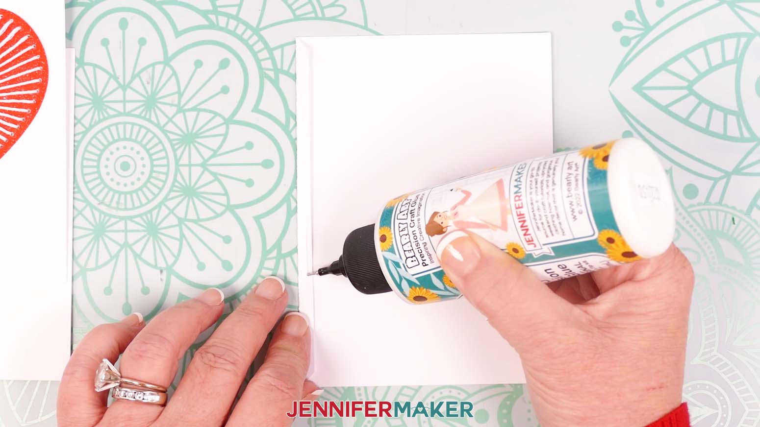 Apply a thin line of craft glue along the small flap.