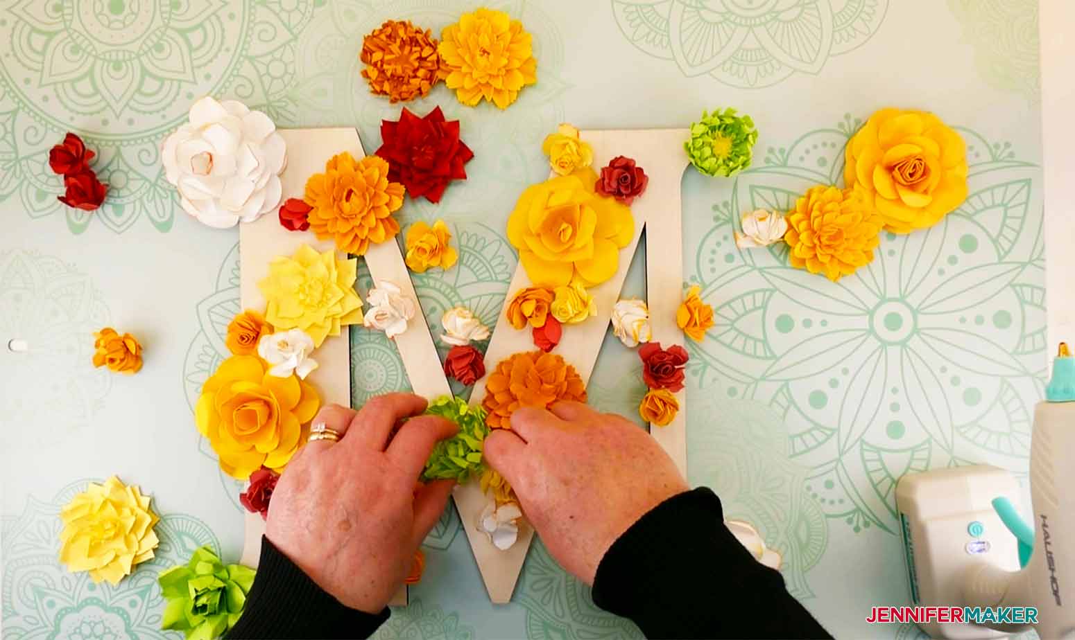 Arrangement of paper flowers on letter for my paper flower letter