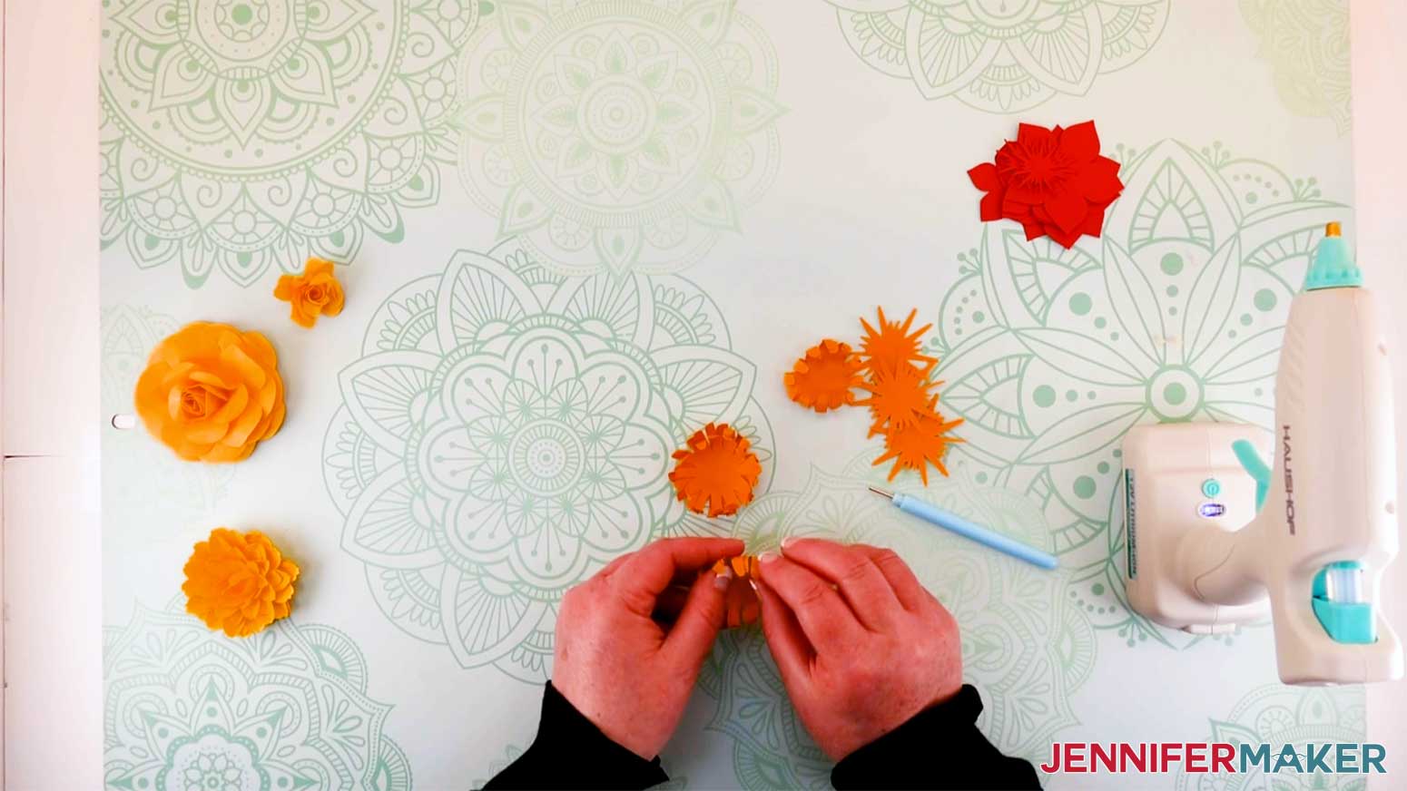 curling the petals of the paper flower mum for my paper flower letter