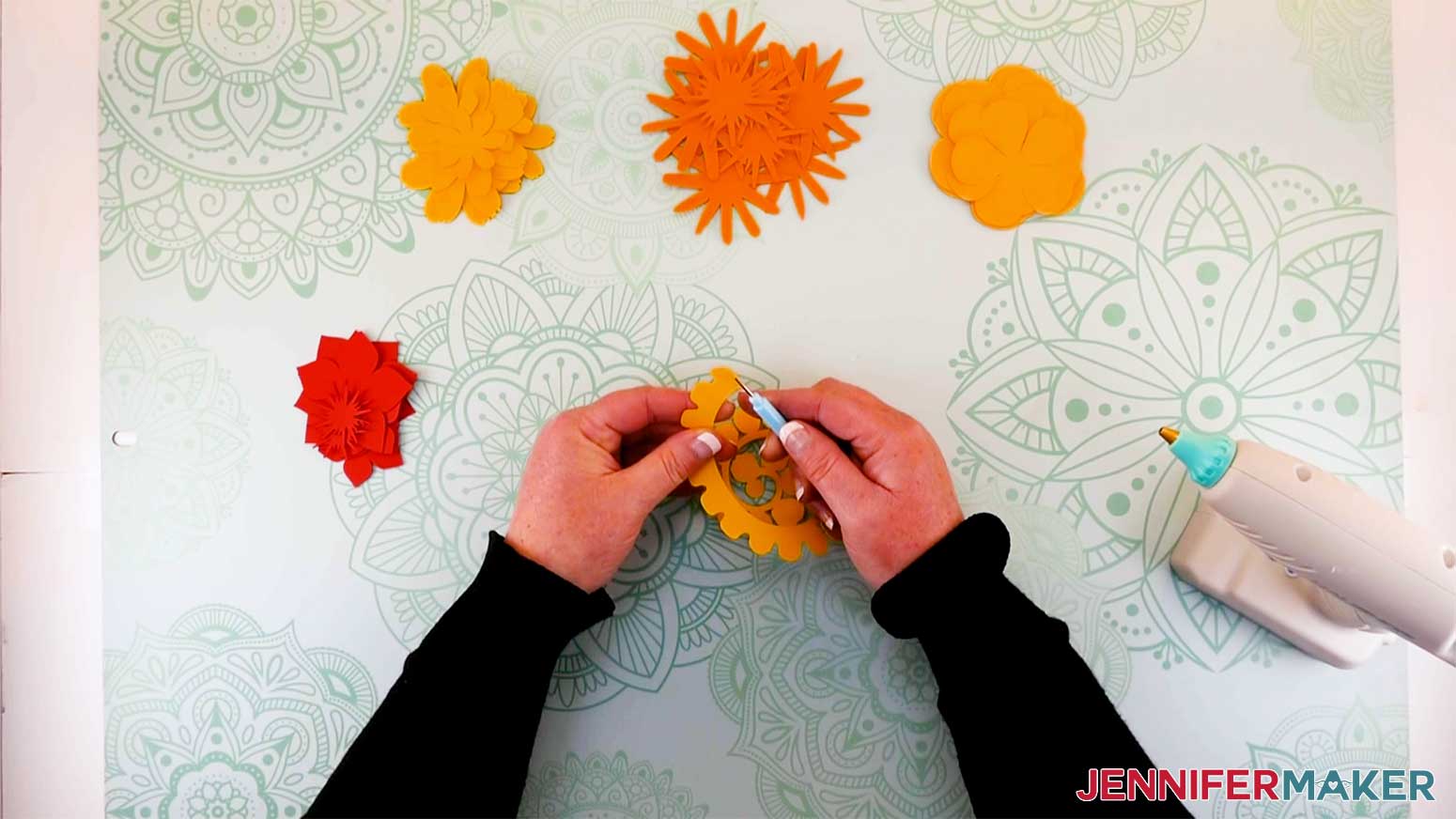 Place the flower end on the quilling tool to prepare for rolling for my paper flower initial