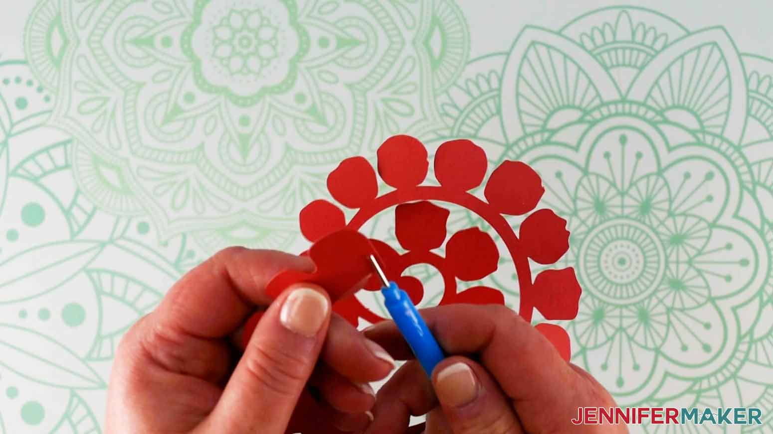 Insert cardstock into the quilling tool for my paper flower shadow box