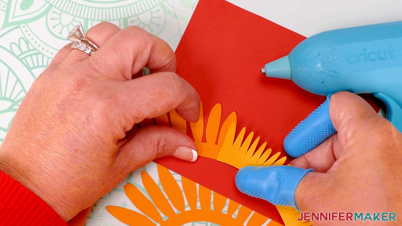 Use hot glue to attach the daisy pieces together.