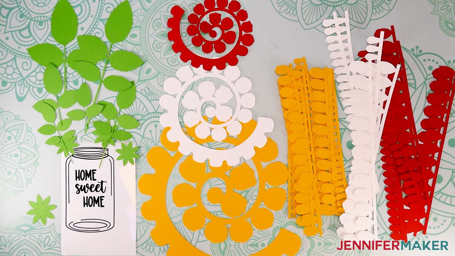 All cut pieces face up for the mason jar paper flower sign.