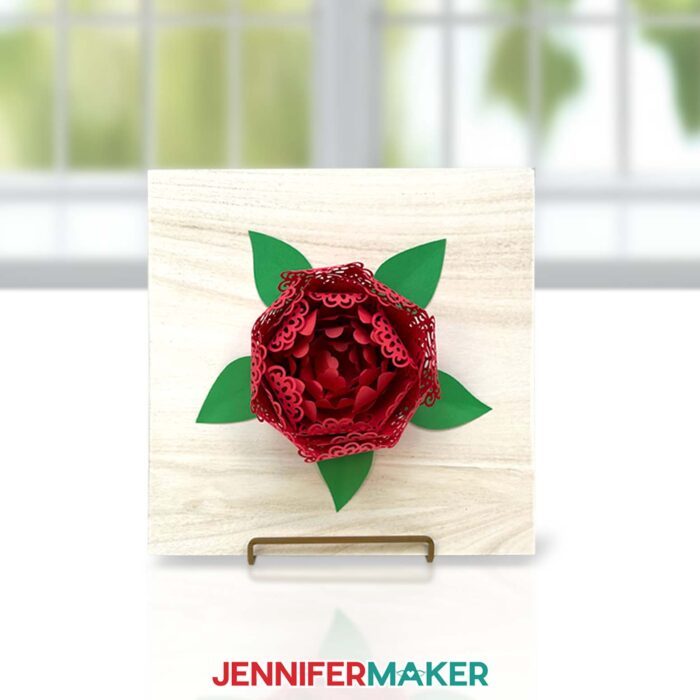 A red paper peony with lace petals on a wood sign, by JenniferMaker.