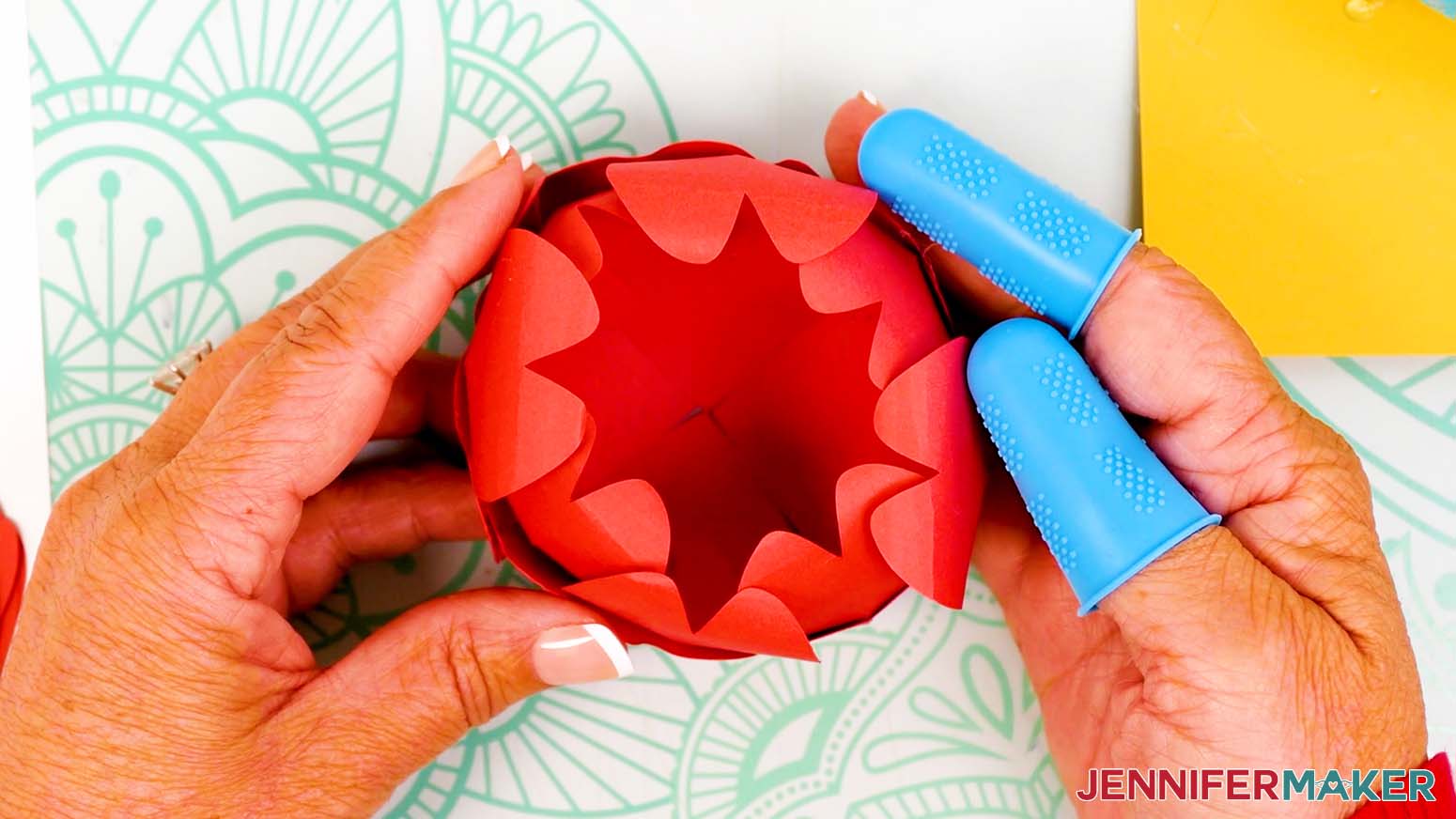 Adhere a large petal about 3/4 of the way down in each of the bowl’s four corners.