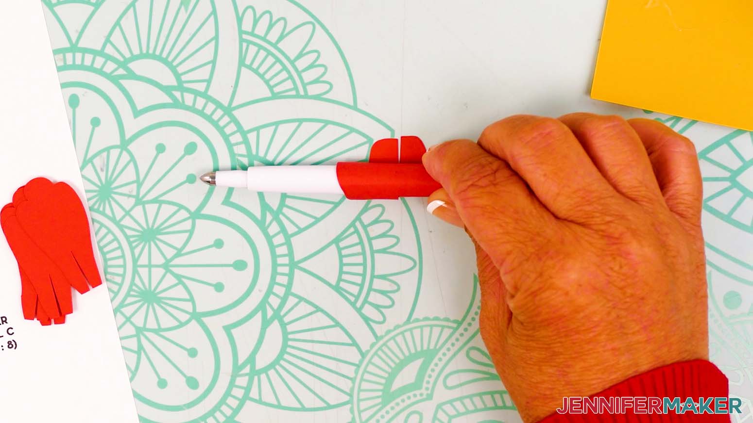 Roll the edge of the large inner petal piece against a Scoring Stylus halfway toward the tabs.