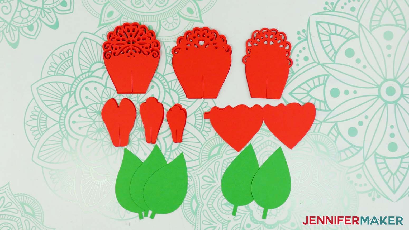 The cut cardstock pieces for the peony flower with lace petals.