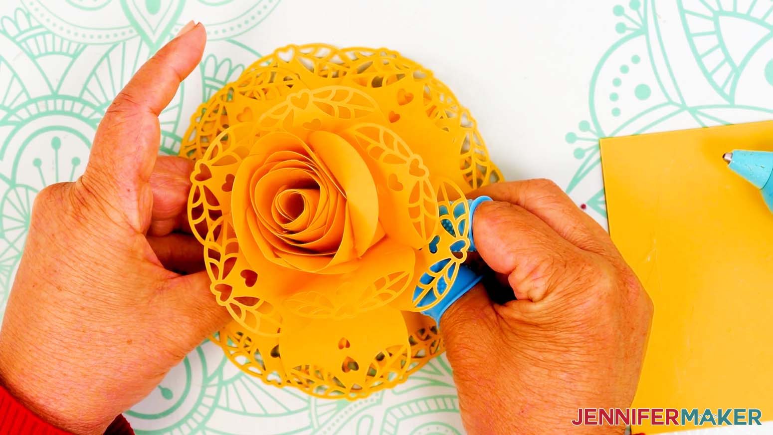 Continue with the second layer of lacy petals but gluing at the base of the petal and pressing it into place against the back of the first layer.