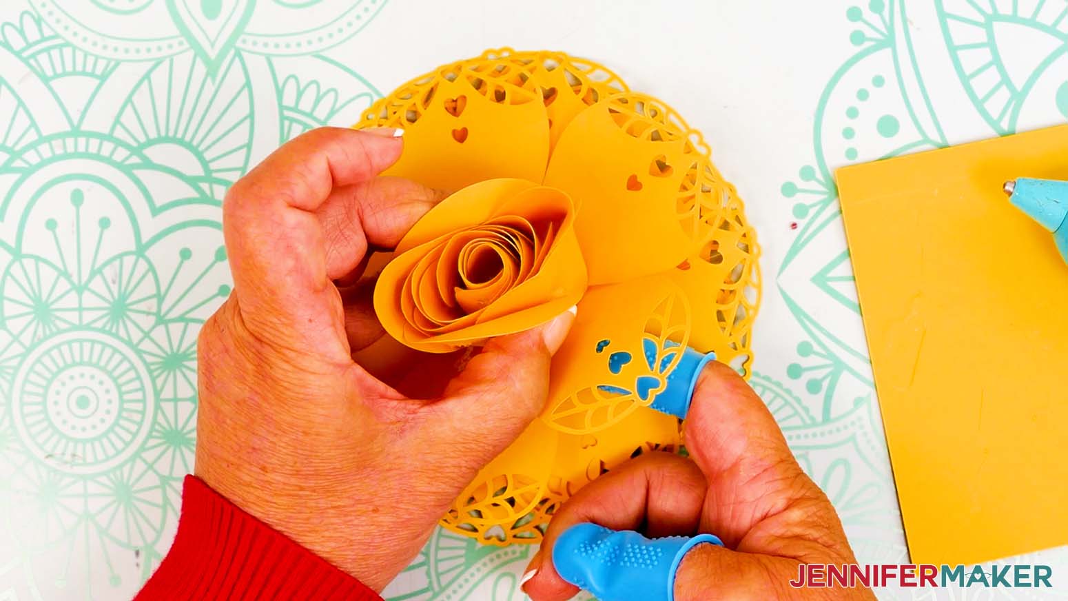 Press the lacy petal against the bud to create a fanned petal look.