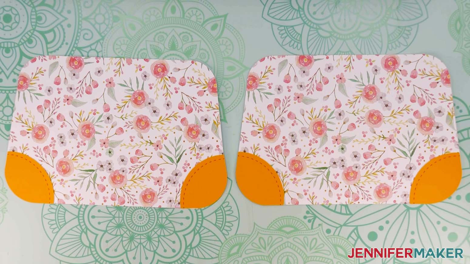 An overhead photo showing the front and back pieces for the Flower Power paper handbag with the bottom left and right trim pieces attached to each one.