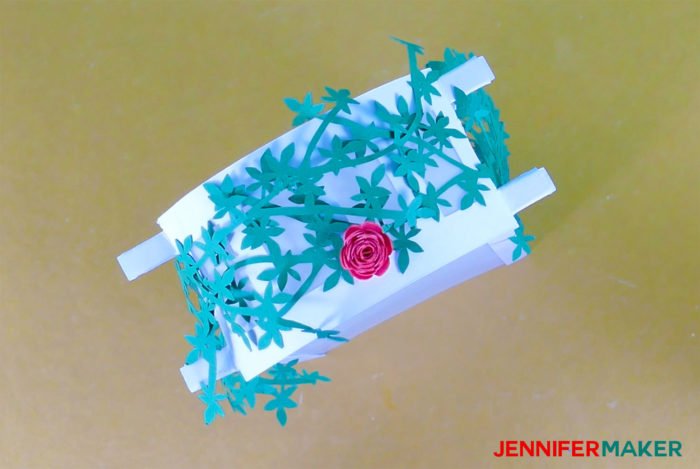 Glue the roses to the vines to make Paper Rose Arbor Luminary