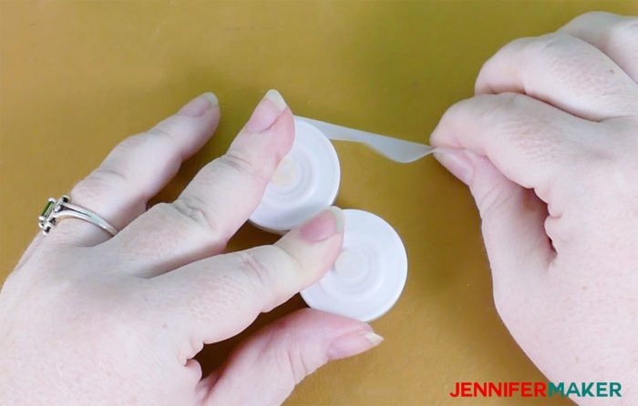 Tape two LED tealights together to make Paper Rose Arbor Luminary