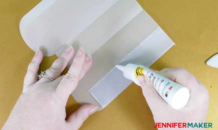 Gluing the vellum to make Paper Rose Arbor Luminary