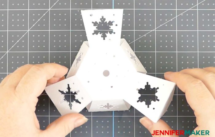 Three sides of the base glued for the Paper Snowflake Christmas Tree Luminary