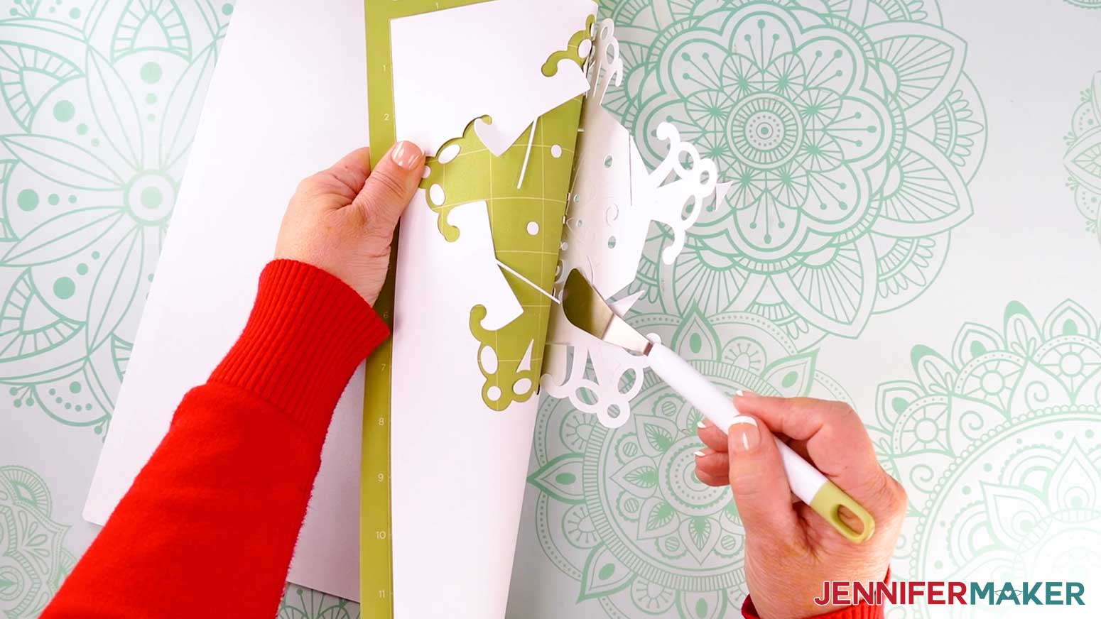 Use a spatula to help release the kraft board.
