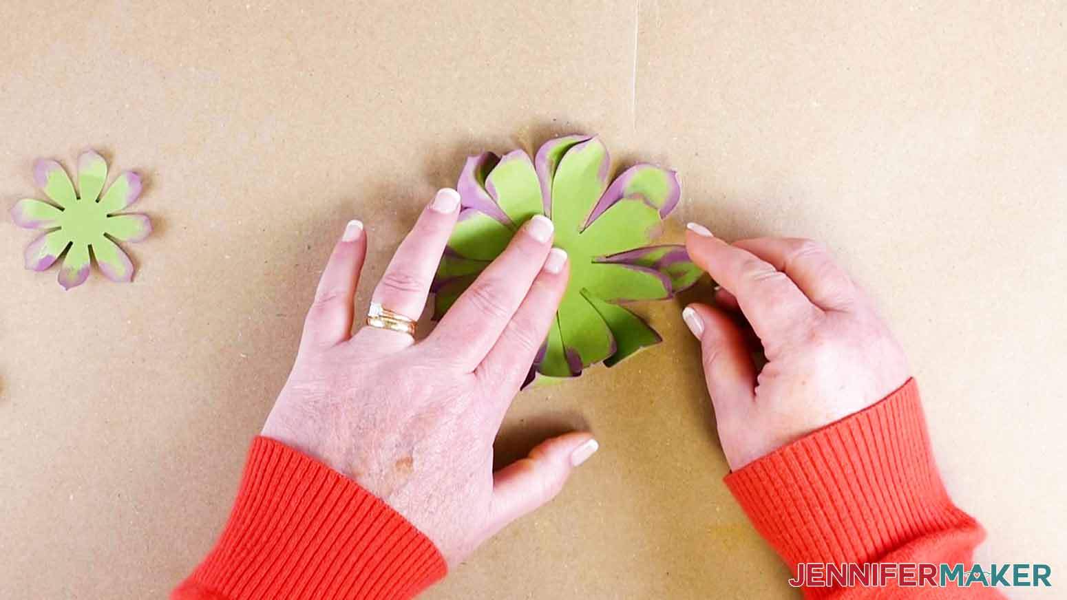 Assemble the succulent by staggering the pieces when making my paper succulent project