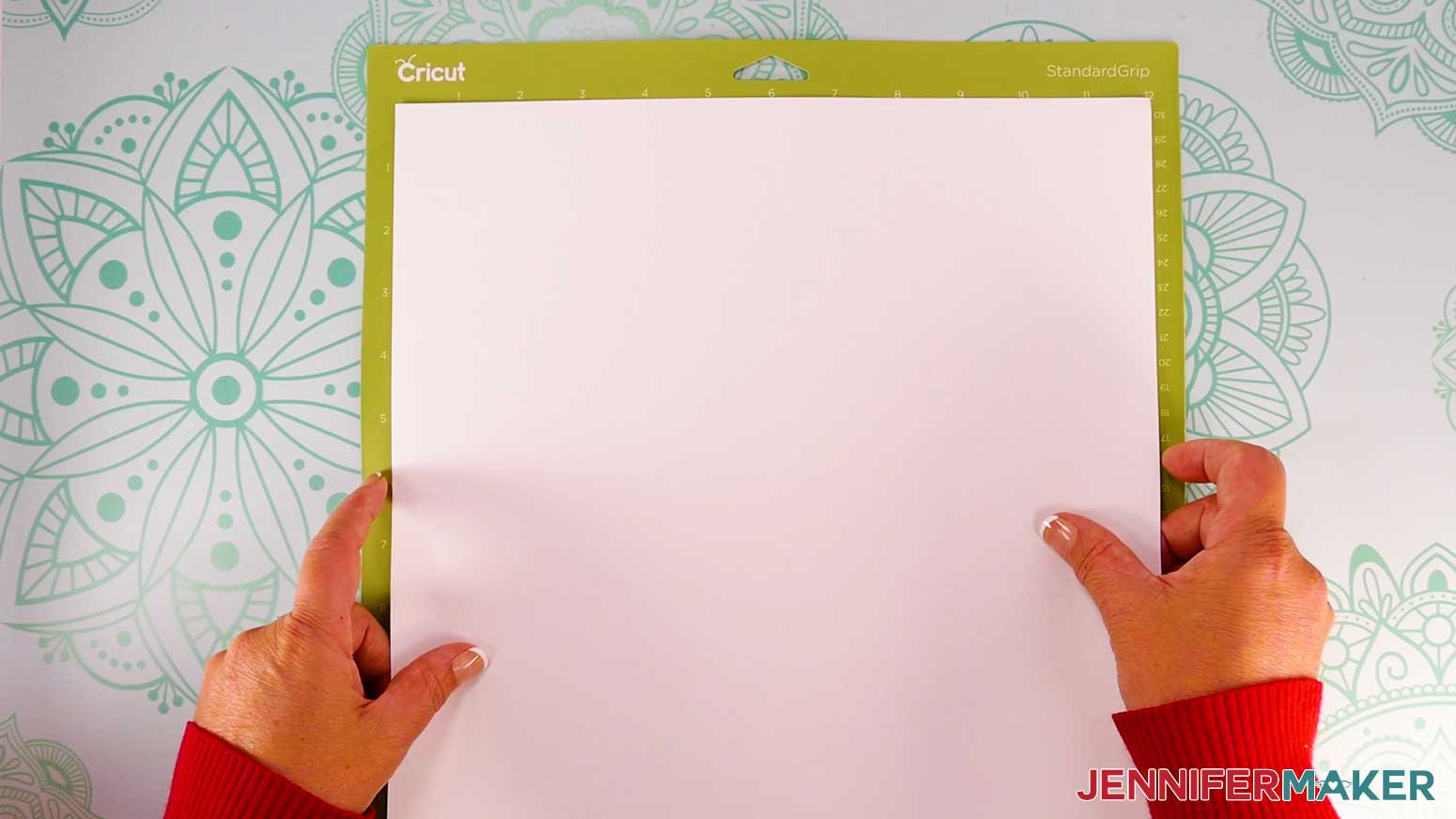 Place your cardstock face up on a green StandardGrip machine mat.